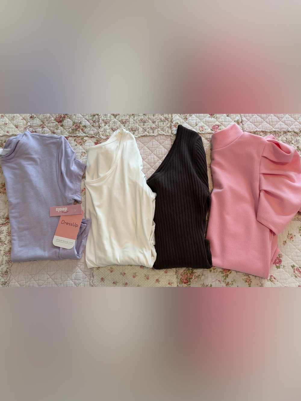 4 bodysuits brand new. One with tags and three without. Two short and two long s